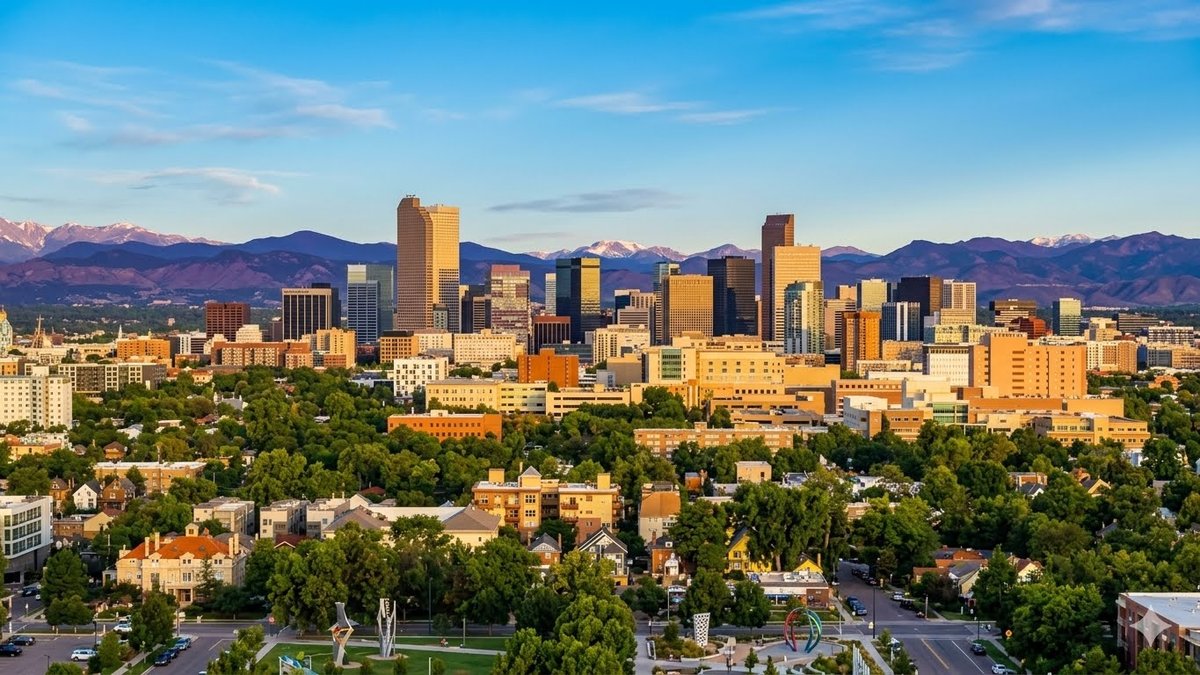 Denver skyline with the Rocky Mountains behind — Ben's Blinds serves all of Metro Denver